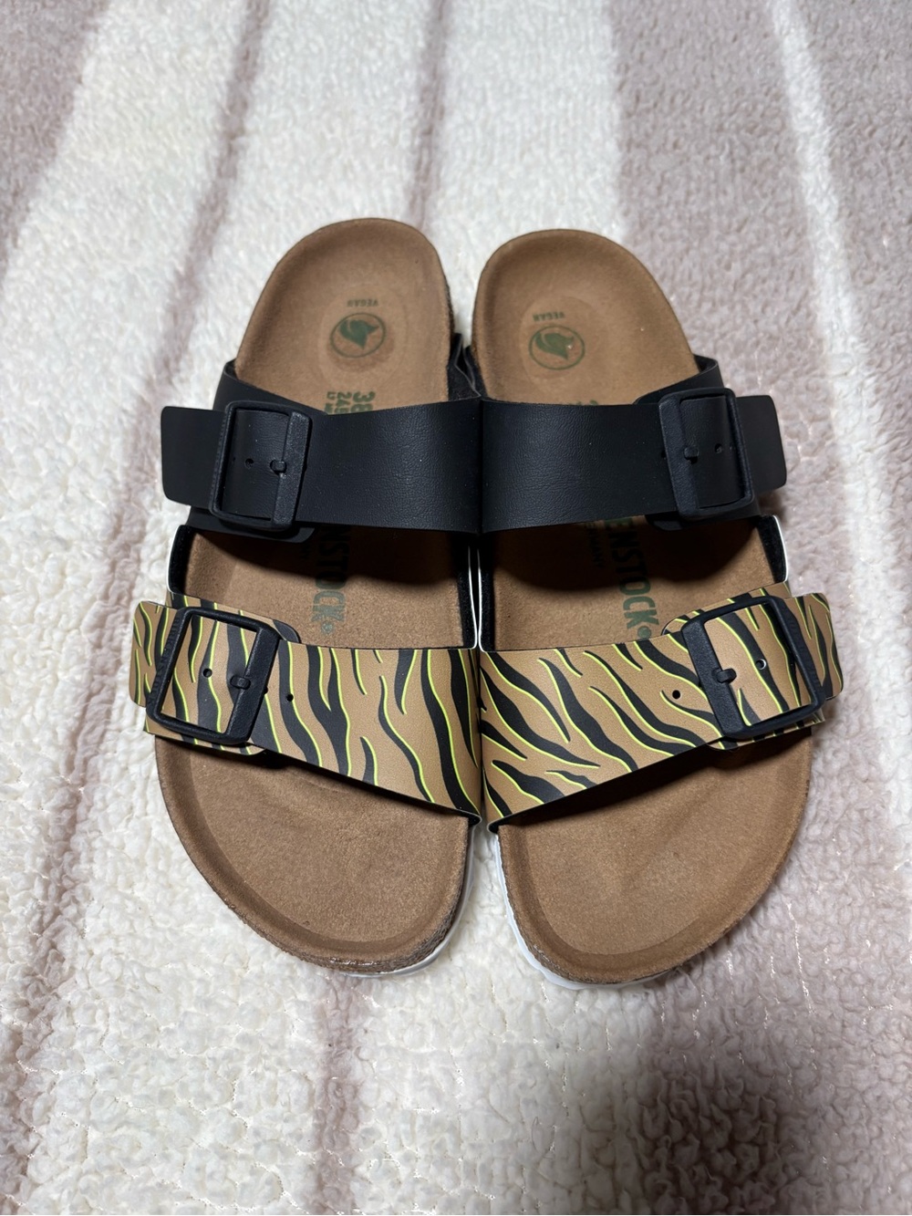Birkenstock Two-Strap Sandals in Black and Brown Zebra Print